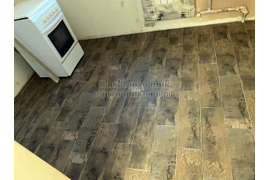 Укладка керамогранита под паркетную доску со сноской на одну треть