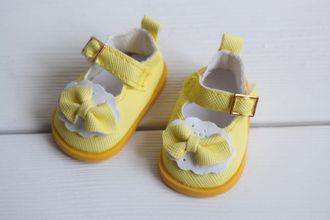 Туфельки с бантом желтые