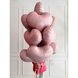 Пышная связка нежно-розовых матовых гелиевых шаров в форме сердец Троицк Новая Москва.