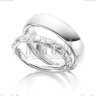 Классические обручальные кольца из белого золота с крупными бриллиантами в женском кольце