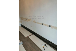 укладка кафельной плитки на стены в кухне