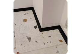 Элегантный переход: установка тонкого черного плинтуса Dollken WLK 20 для создания плавного перехода между поверхностями.