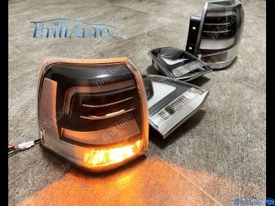 Cтопы Toyota Land Cruiser 200 07-15 в стиле 21 года LED (дымчатые серые)