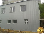 Облицовка ремонт зданий монтаж фасадов сайдинг панелями проф листом в Мурманске.