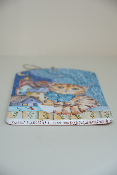 Кошка на окошке