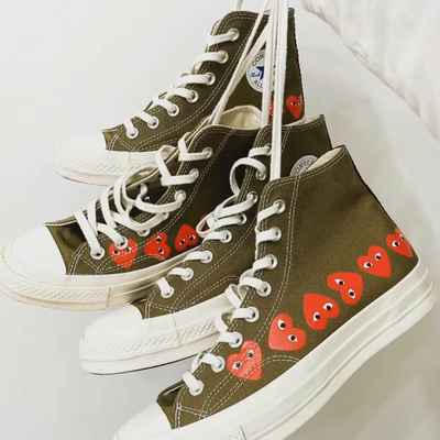 Новая модель Кеды Converse Comme des Garcons высокие хаки с сердечками 162973C