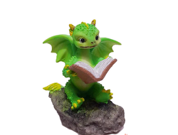 Дракон читает книгу символ года 2024