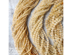 Цитрин облагороженный трещиноватый со шторками, радужкой, шары 8,3-8,7/10,4-10,7 мм, цена за нить 19 см