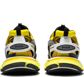Balenciaga store yellow trainers