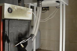 Врезка горелки в дверцу котла