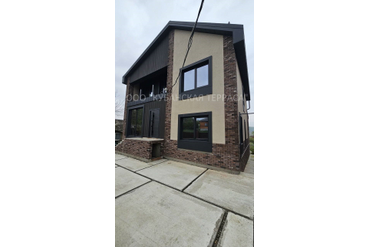 Облицовка фасада здания ДПК