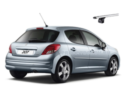 Дуги THULE для PEUGEOT 207 в штатные места