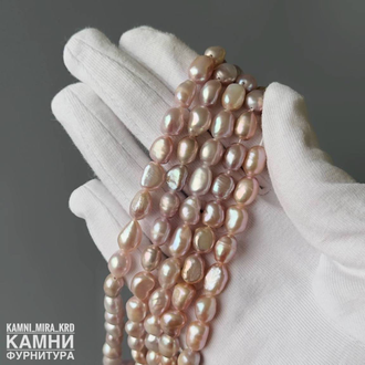 Жемчуг речной розово-бежевый средний рис 6,6-7,2х7,3-10,2 мм, цена за нить 17 см