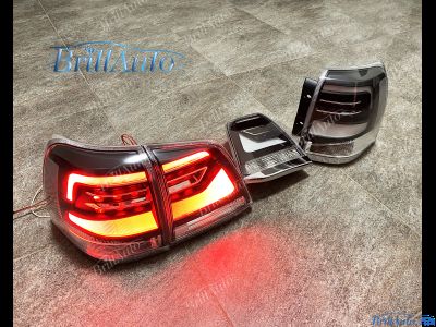 Cтопы Toyota Land Cruiser 200 07-15 в стиле 21 года LED (дымчатые серые)