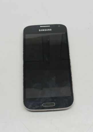 Неисправный телефон Samsung GT-I9500 (нет АКБ, не включается, скол на задней крышке)