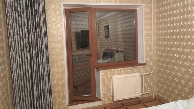 Балконный блок с ламинированным пластиком