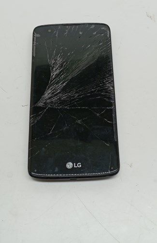 Неисправный телефон LG K350E (нет АКБ, разбит экран, не включается)