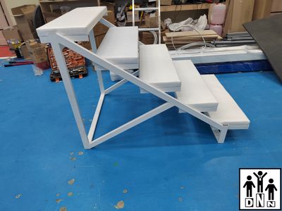 Ринг боксерский на помосте соревновательный, быстровозводимый, безболтовой (помост 7х7м, высота 1м (две лестницы), боевая зона 6х6м) DNN