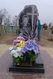 Картинка памятника скала с крестом из гранита на могилу в СПб
