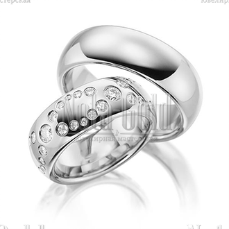 Обручальные кольца широкие из белого золота с огранкой с бриллиантом в женском кольце с выпуклым про