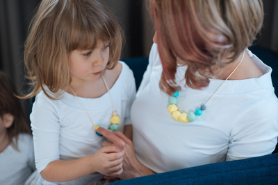 Бусы-прорезыватель из силикона Кремовые