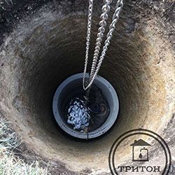 Копка шахты открытым способом, монтаж колец в колодец.