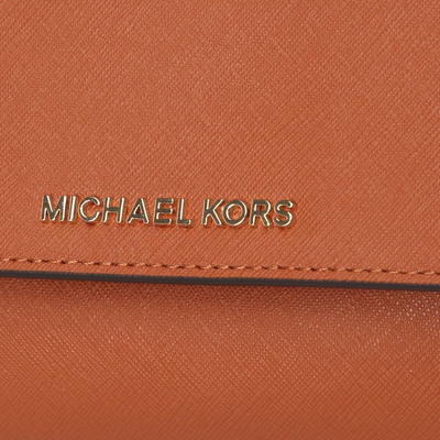 Оранжевый клатч майкл корс джет сет