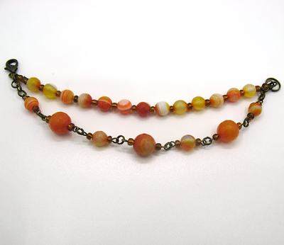 Комплект украшений "Мотивы": бусы и браслет из агата