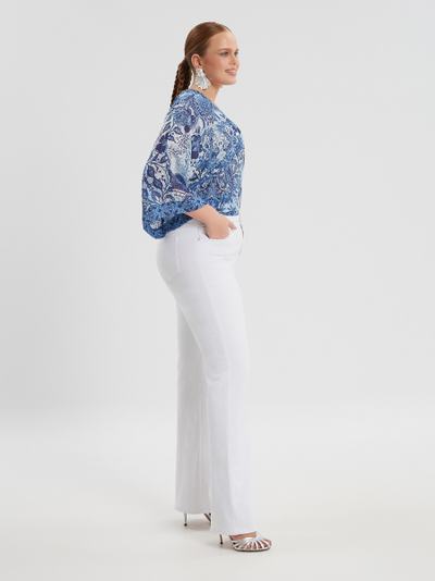 Джинсы клеш белые