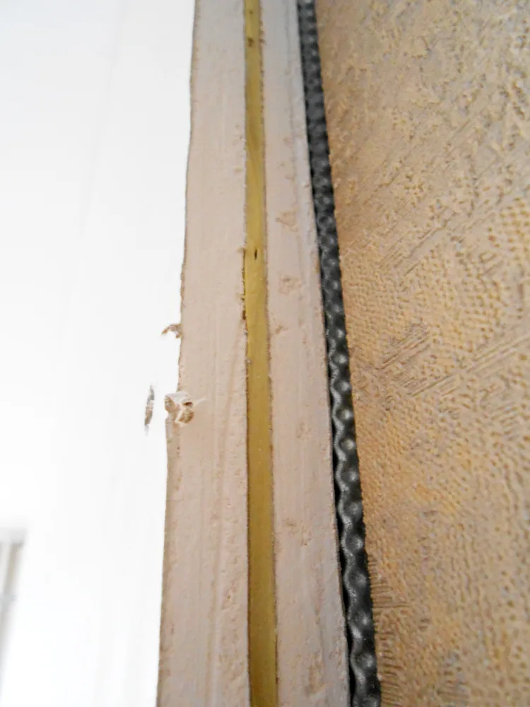 Заключительный этап звукоизоляционной системы: монтаж мембраны "Тексаунд 70" между двумя слоями ГКЛ