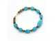 "Восточная фантазия". Браслет из голубых бусин кварца и коралла