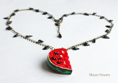 Колье с арбузной долькой и семечками.