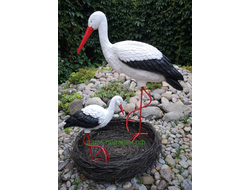 Аист с детёнышем в гнезде 2шт (Аист-70см, аист-115см ) полистоун Аист - является символом новой жизни. Согласно русским народным поверьям, аист - птица, приносящая счастье в Ваш дом. Также аист покровительствует рождению детей.