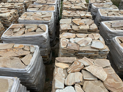 Камень плитняк тигровый песчаник галтованный