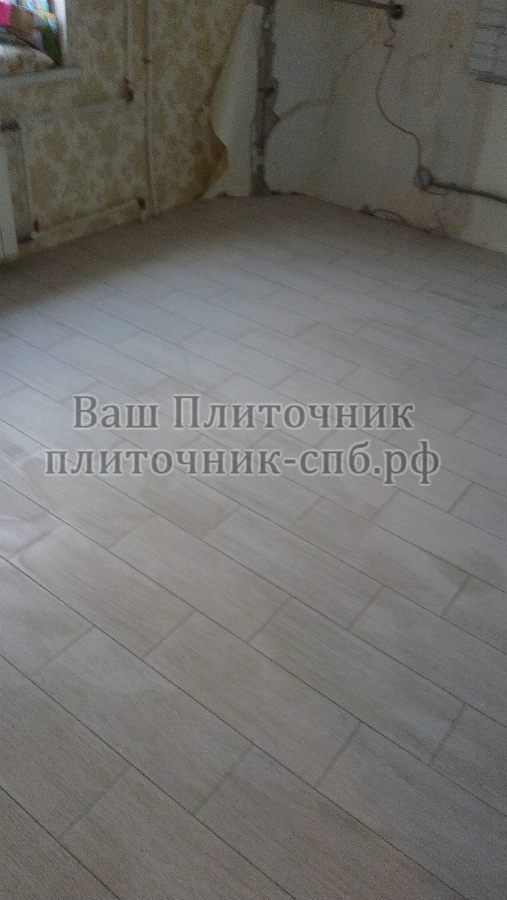 Укладка керамогранита под паркетную доску