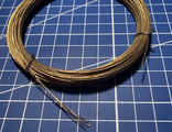 0.65 mm  cable with brass coating.