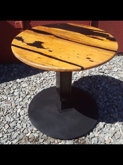 стол из эбенового дерева круглый