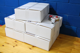 Упакованные и готовые к отправке почтовые ящики