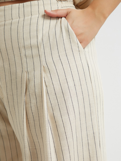 Брюки молочного цвета в полоску
