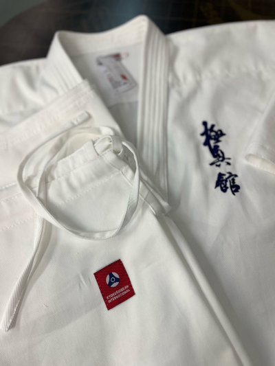 Детские доги (кимоно) отбеленные шинкиокушинкай