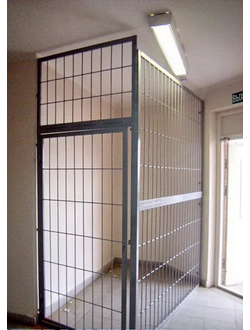 Металлические решетчатые тамбурные двери для технических и подъездных помещений