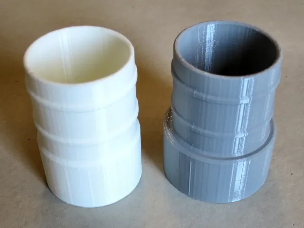 Переходники для пылесоса: белый 52х50 мм; серый 58х50 мм