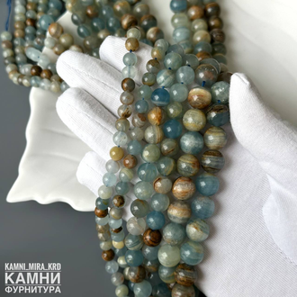 "Карибский оникс" голубой кальцит шары 8,3-8,5/10,4-10,6 мм, цена за нить 19 см