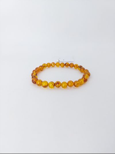 Браслет шары из коньячного янтаря