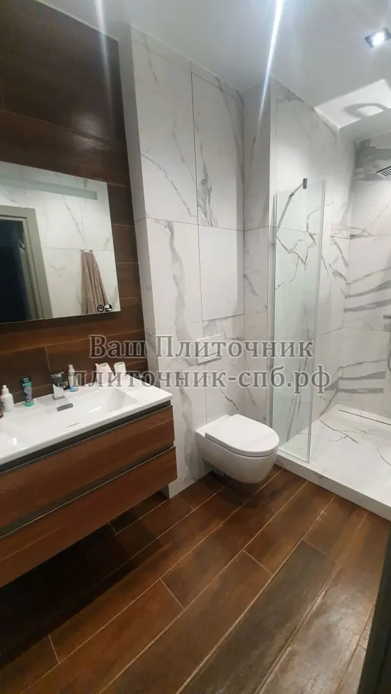 Облицовка душевой керамогранитом 120*60 см с заусовкой плитки под 45 градусов на углах