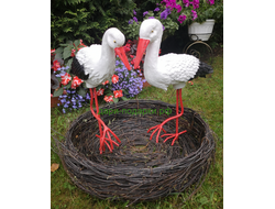 Аисты в гнезде Парочка ( Аист-70см, аист-72см ) полистоун Аист - является символом новой жизни. Согласно русским народным поверьям, аист - птица, приносящая счастье в Ваш дом. Также аист покровительствует рождению детей.