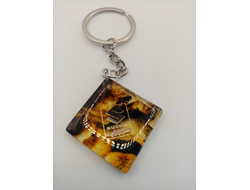 Брелок из натурального янтаря "SUZUKI"