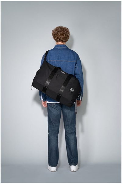 Consigned holdall top