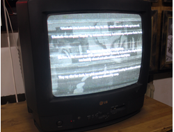 Small old TV on pedestal