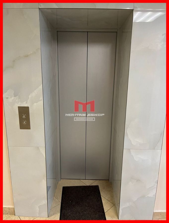 Оклейка створок лифта текстурной плёнкой SOIF